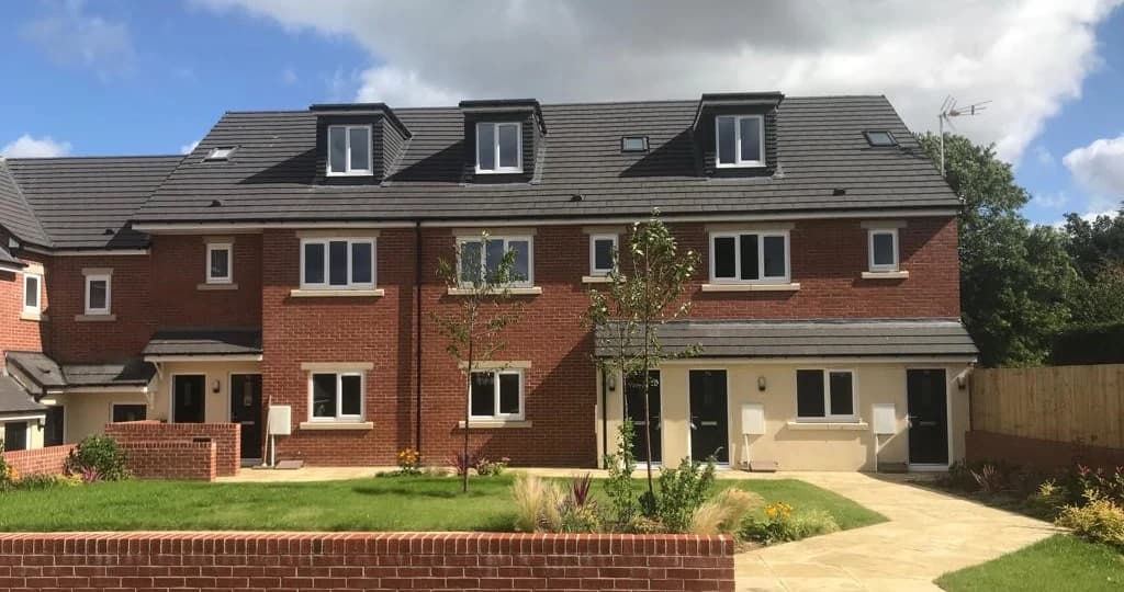 Three-storey newbuild apartments with landscaped frontage at Park Place, Seacroft, Leeds