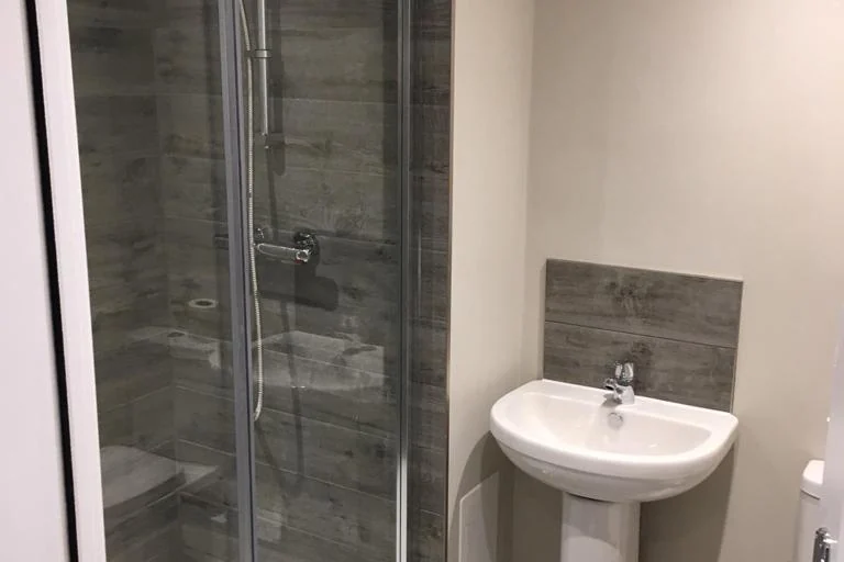 Cross Green House, Leeds: a shower room
